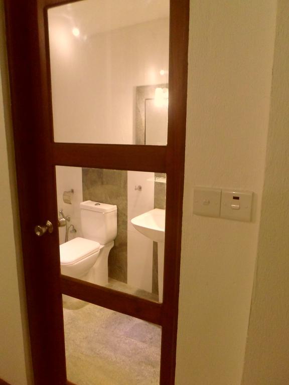 Nilas Guesthouse Хиккадува Номер фото